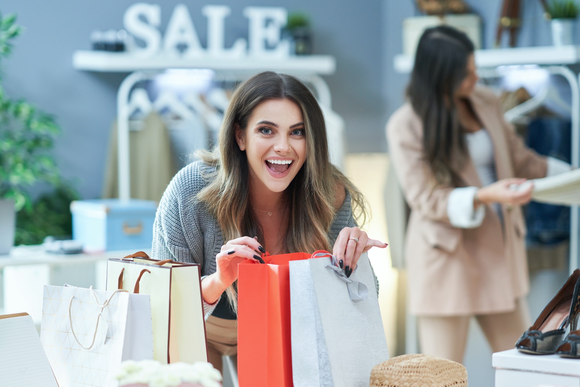 Group of happy friends during shopping