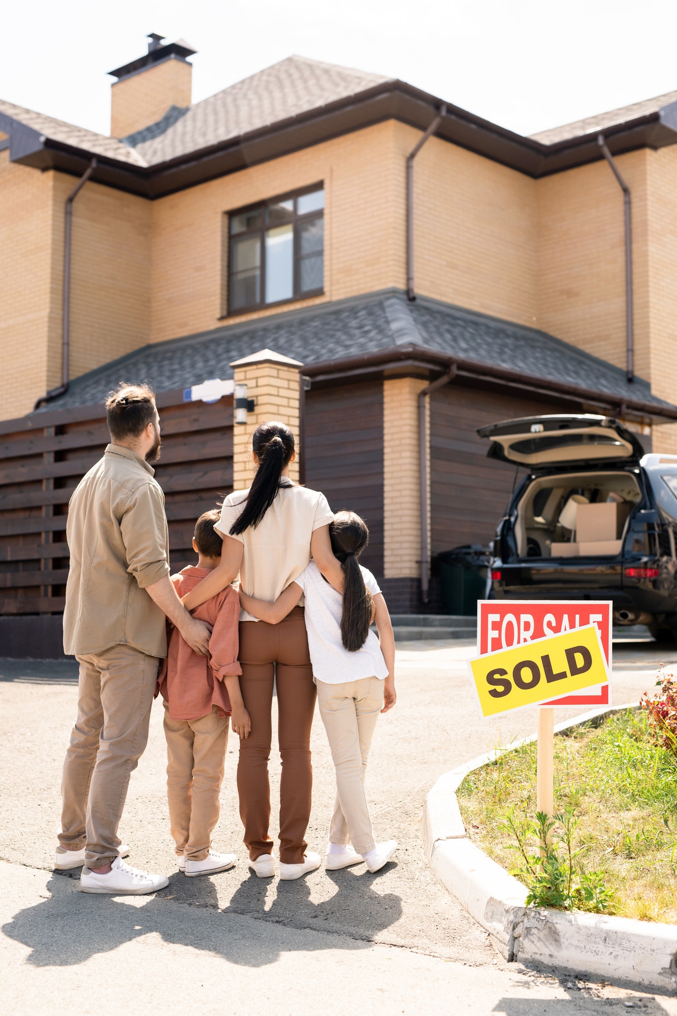 Young family dreaming of new life in new house